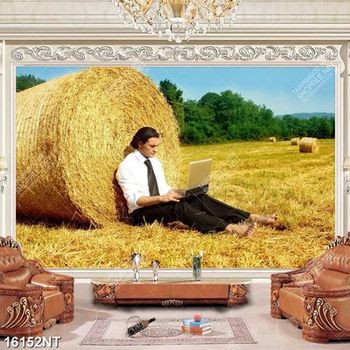 Tranh chàng trai ngồi bên cuộn rơm