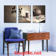 tranh thư pháp và ấm nước trà