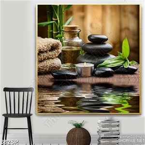 Tranh đá cuội đen và nến thơm spa