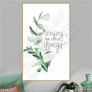 Tranh cành lá xanh bên dòng chữ trên tường quán cà phê
