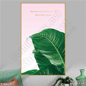 Tranh chiếc lá xanh trên nền tường màu hồng quán cà phê