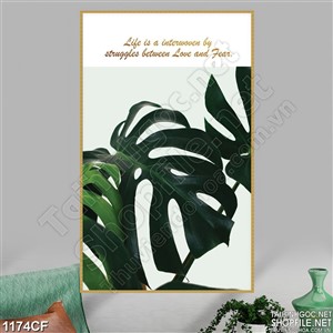 Tranh tách cà phê bên những cành lá xanh trên bàn