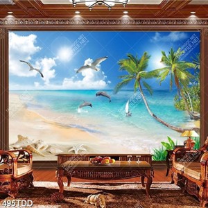 Tranh psd đôi cá heo nhảy múa trên bãi biển