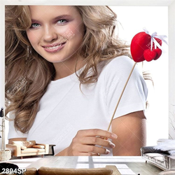 Tranh cô gái xinh đẹp cầm trái tim đỏ trang trí tường spa