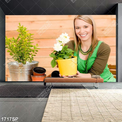 Tranh cô gái trẻ bưng chậu hoa nhỏ trên tay in uv