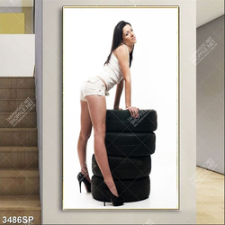 Tranh cô gái trẻ đứng bên chồng lốp xe ô tô