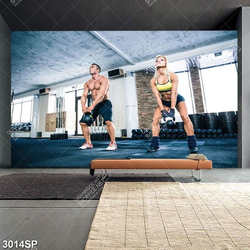 Tranh treo spa chàng trai và cô gái tập luyện để có thân hình săn chắc